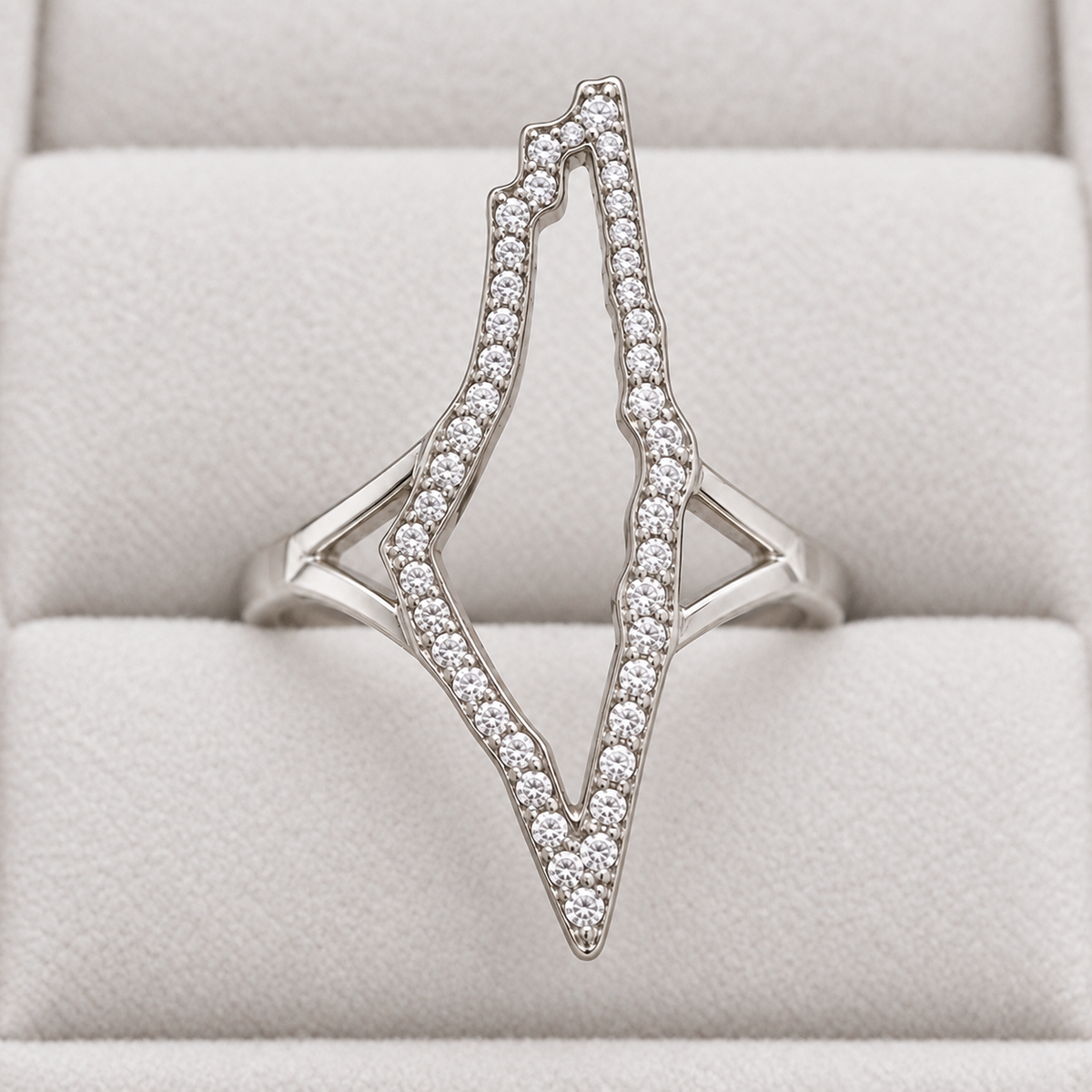 Clear-Stone Open Map Ring – Silver Tone — detail of the visible front design.