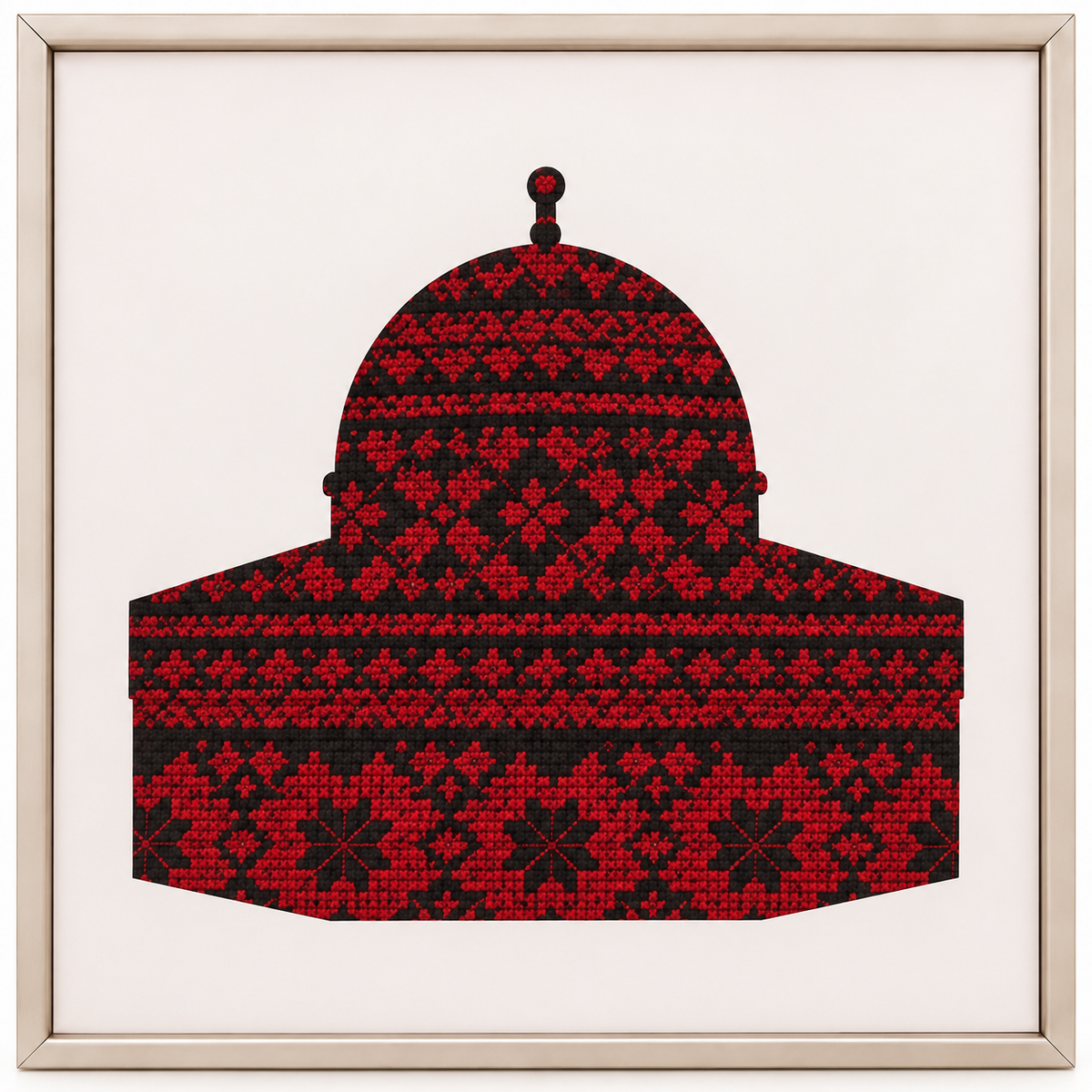 Detail of the red-and-black geometric dome motif in the framed artwork.