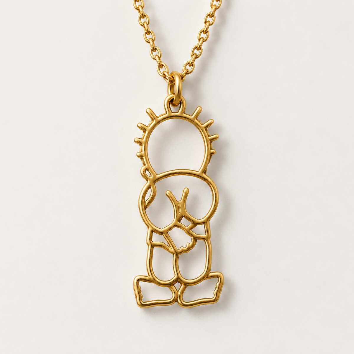 Handala Outline Necklace – Gold Tone — detail of the visible front design.